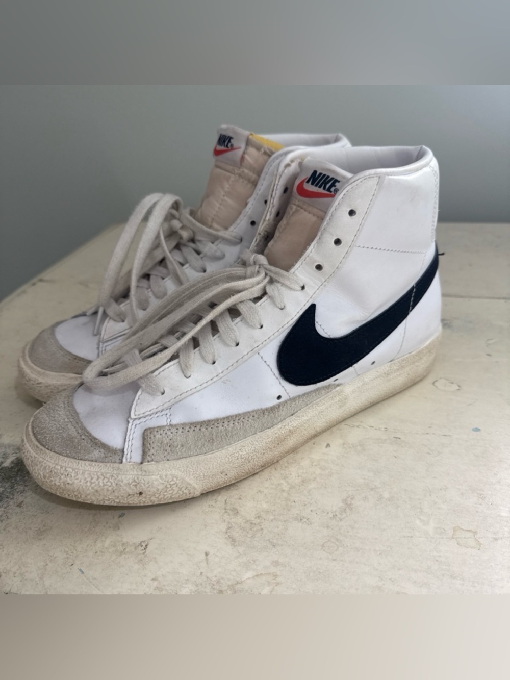 Nike White High-Top Sneakers with Navy Swoosh